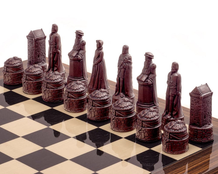 Berkeley Chess Scottish Russet Chess Men on chessboard showcasing intricately sculpted stone resin pieces with deep russet and cream finish.