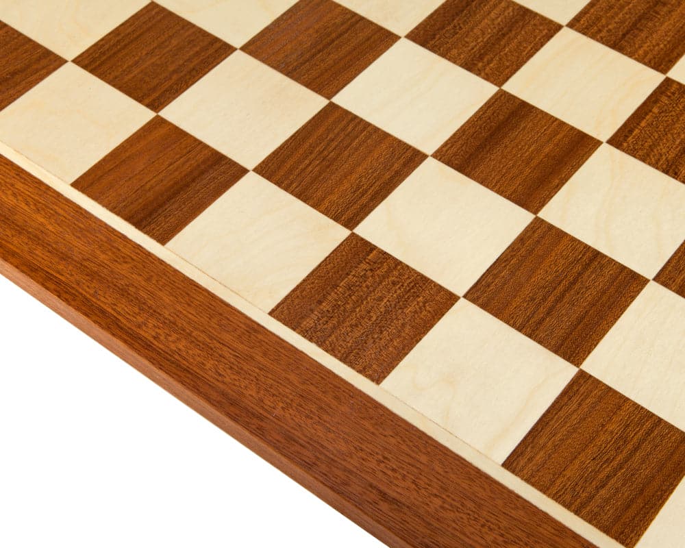 Close-up of 21.3 inch inlaid mahogany and birch chess board with 2.3 inch playing squares, showcasing fine craftsmanship and modern design.