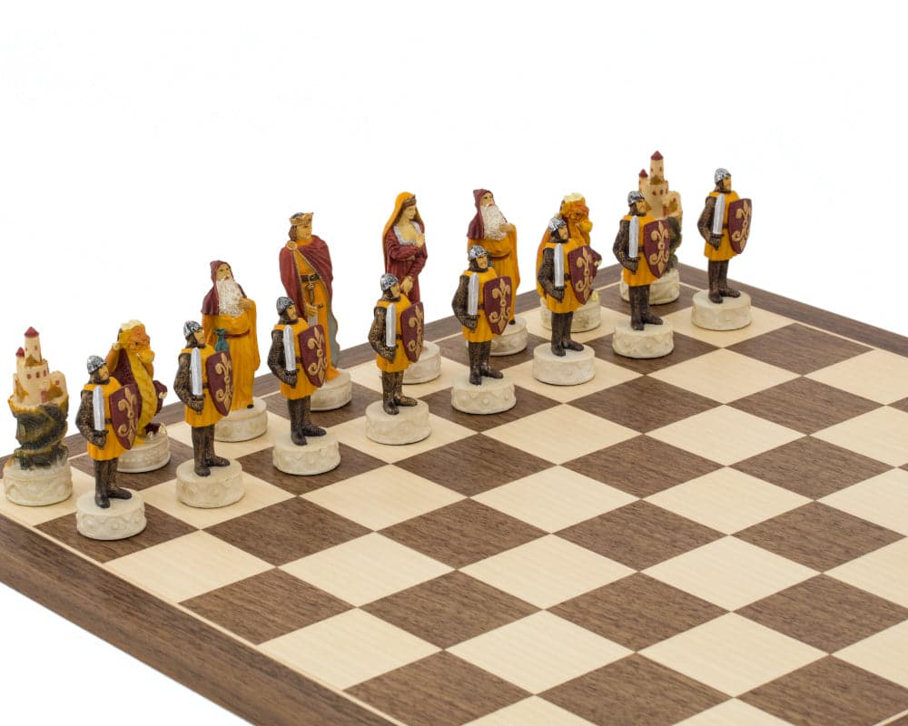 Medieval hand-painted chess pieces by Italfama on a chessboard, featuring exquisite detail, ideal for a 16-inch board.