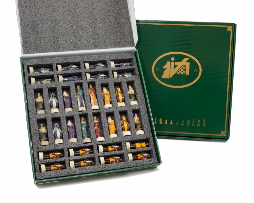 Medieval hand-painted chess pieces by Italfama in a green box, showcasing detailed regal red, orange, blue, and purple figures.