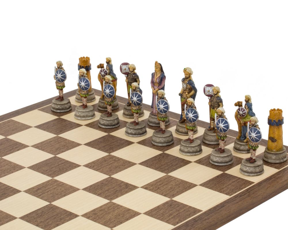 Hand painted Romans Vs Arabs themed chess pieces by Italfama on a chessboard showcasing intricate historical figures.