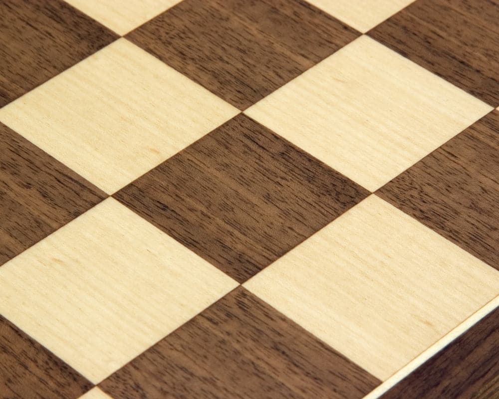 Close-up of 15.75 inch Walnut and Maple chess board with 1.75 inch playing squares, handcrafted by Rechapados Ferrer S.A. in Spain.