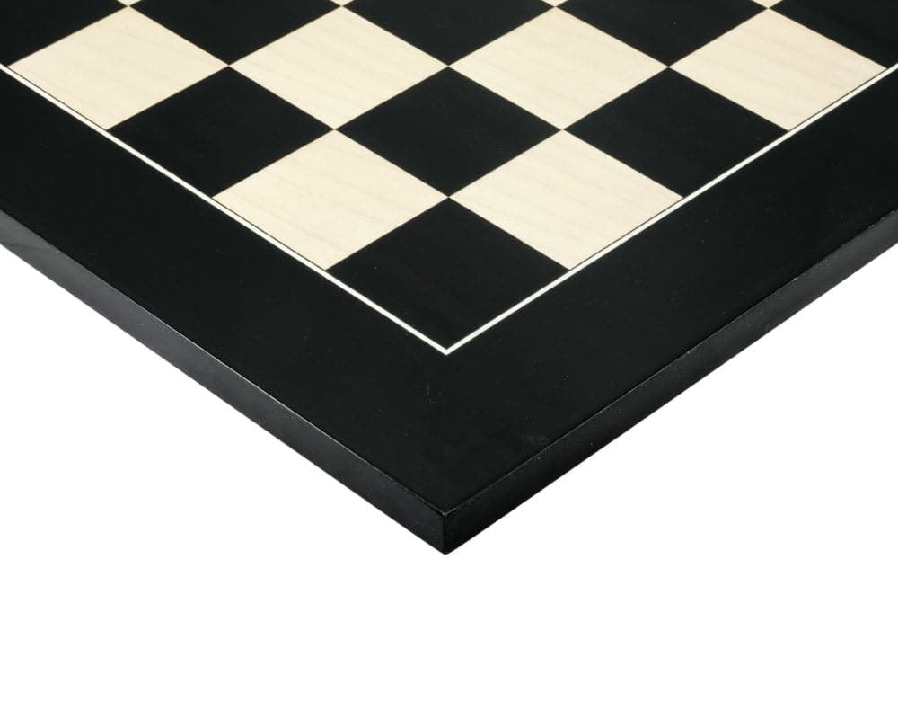 21.7-inch gloss black anegre and maple deluxe chess board with high gloss finish and 2.2-inch playing squares, crafted in Spain.