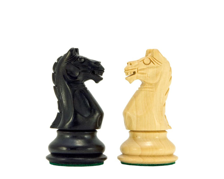 Handcrafted ebonised and natural boxwood knight chess pieces from the Oxford Series, beautifully carved and polished.