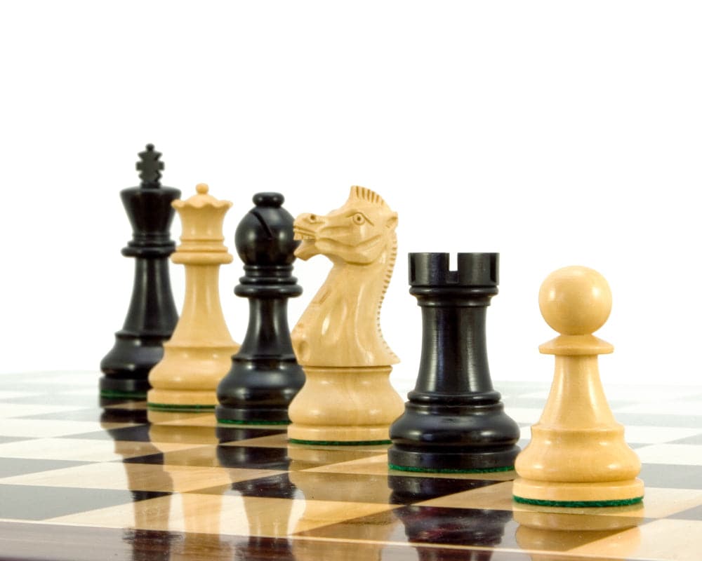 Frankfurt Series Ebonised Boxwood Chess Pieces on a chessboard showing large, quality pieces weighted and felted with a 4-inch king.