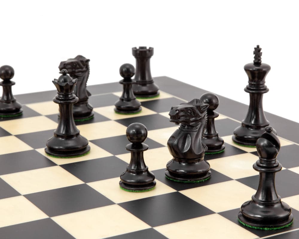 Highgrove Series Ebonised Staunton Chess Pieces 3 Inches in classic Staunton design on chessboard.