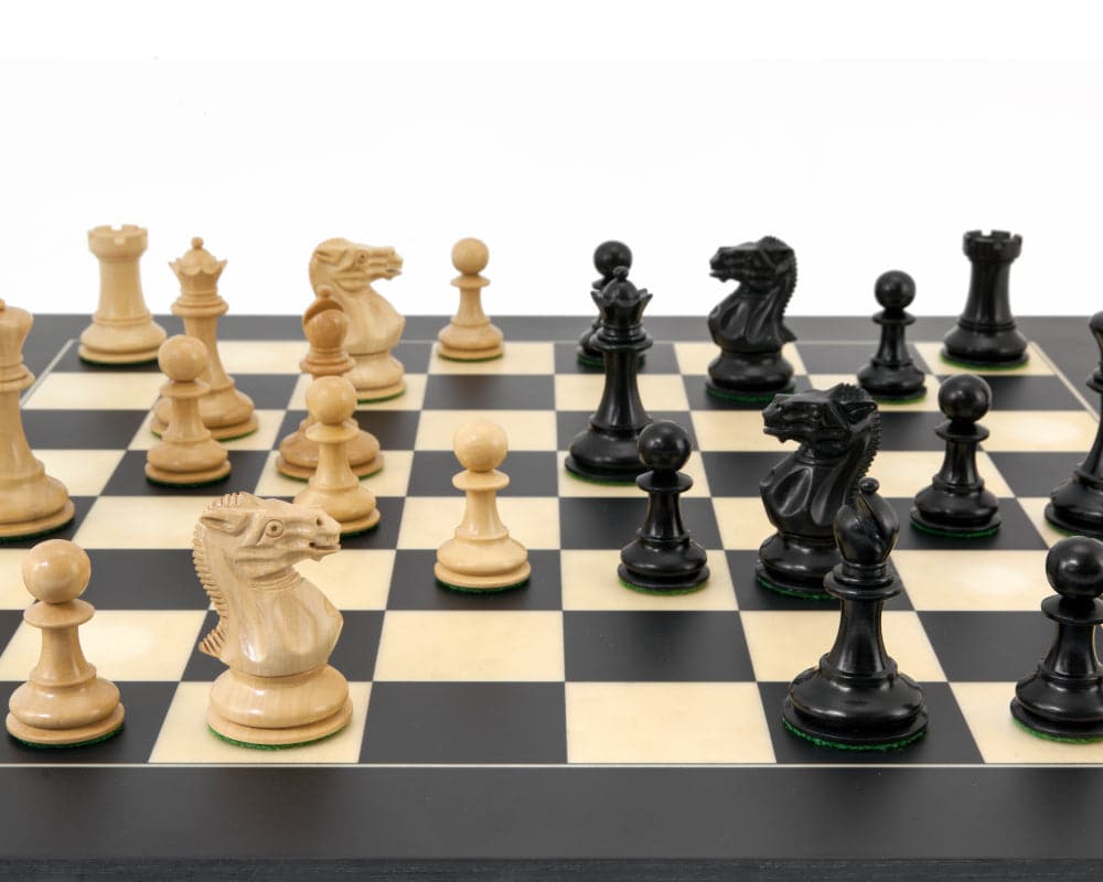 Highgrove Series Ebonised Staunton Chess Pieces on 20-inch board, featuring detailed hand-carved boxwood knights and bishops.