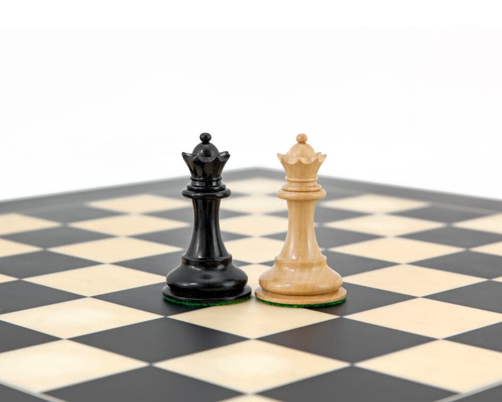 Highgrove Series Ebonised Staunton Chess Pieces - Black and white kings on chessboard - 3-inch classic Staunton design