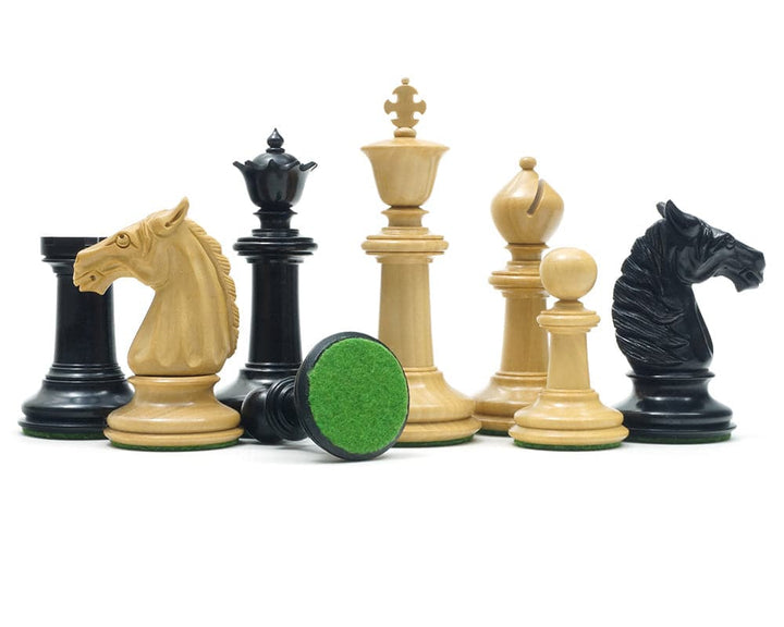 Traditional Staunton Ebony Bath Chessmen set featuring hand-carved solid ebony and boxwood pieces with felted bases.