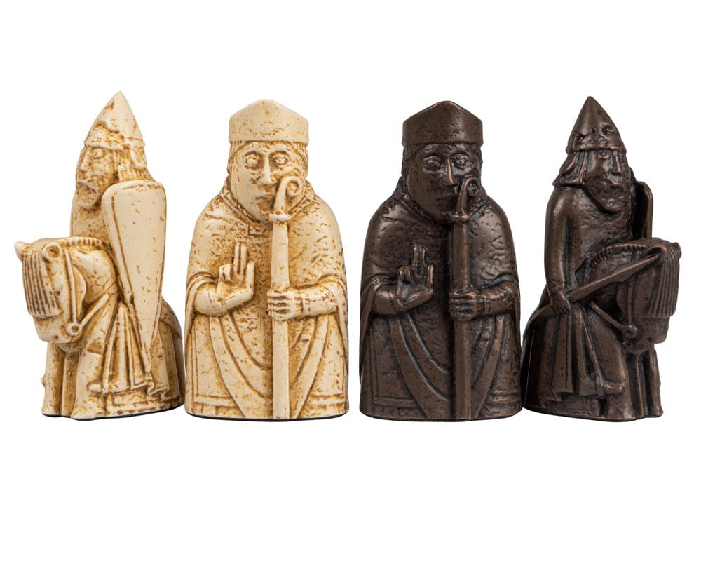 Exquisite handcrafted Lewis Chessmen pieces in ivory and dark colors, presented as part of the high-quality Regency Chess Official Lewis Chessmen Set.