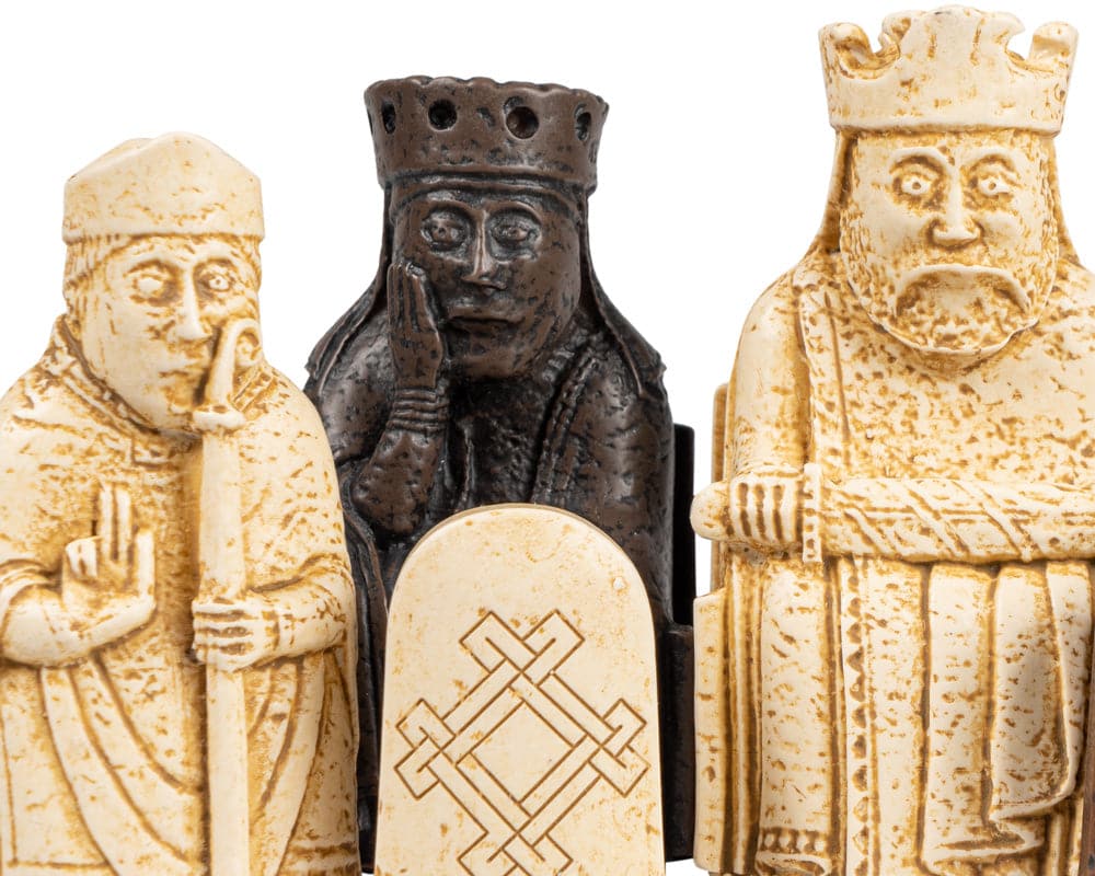 Close-up of superb quality Lewis Chessmen pieces, including two kings and a bishop, intricately crafted from laser scans of the originals.