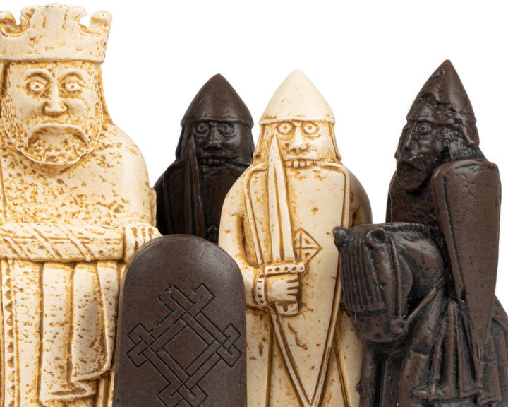 Close-up of Isle of Lewis chessmen replicas on Italian Briarwood board