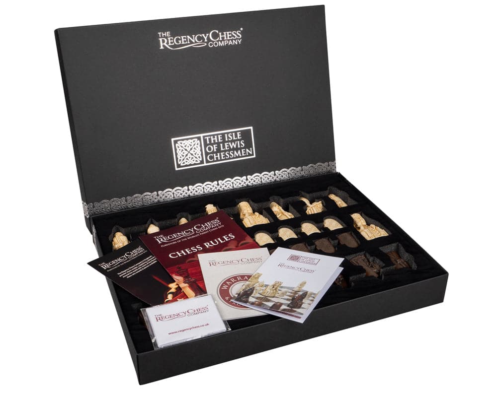 The Isle Of Lewis Italian Briarwood Chess Set featuring intricately designed British-made chess pieces in an open presentation box.