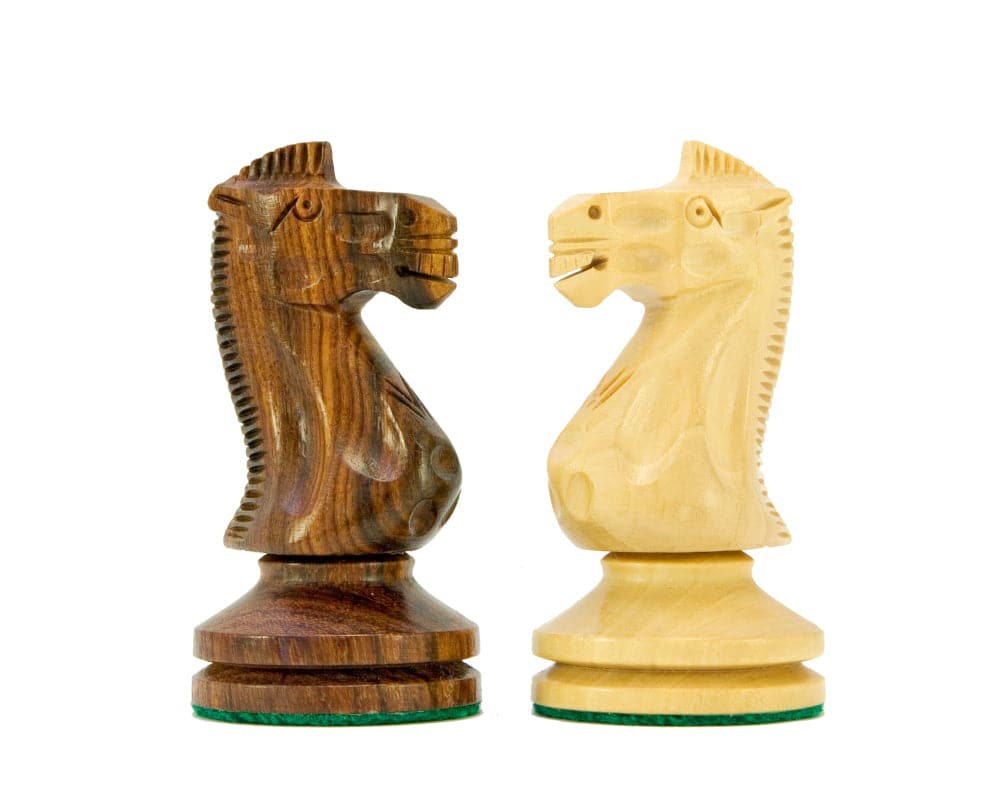 Sheesham and boxwood chess knights from Blackmore Sheesham and Mahogany Chess Set showcasing detailed craftsmanship and rich wood grains.