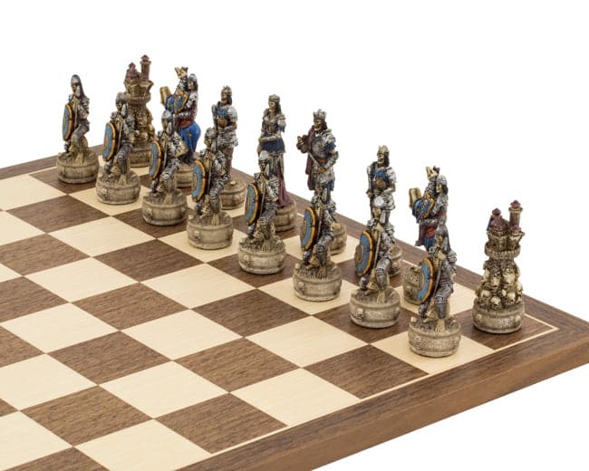 The Zombie Hand Painted Chess Set with intricately designed undead warrior pieces on a 16-inch board, crafted in Italy by Italfama.