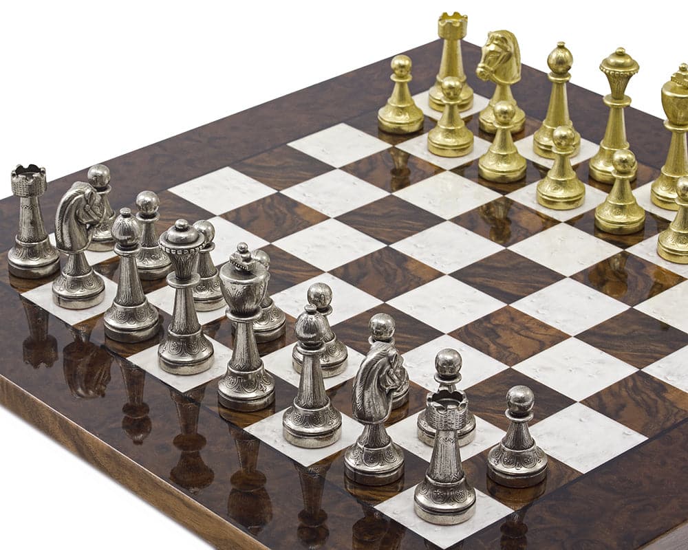 The Finnesburg and Dark Walnut Luxury Chess Set on 17-inch Briarwood board with solid brass and nickel-plated chess pieces.