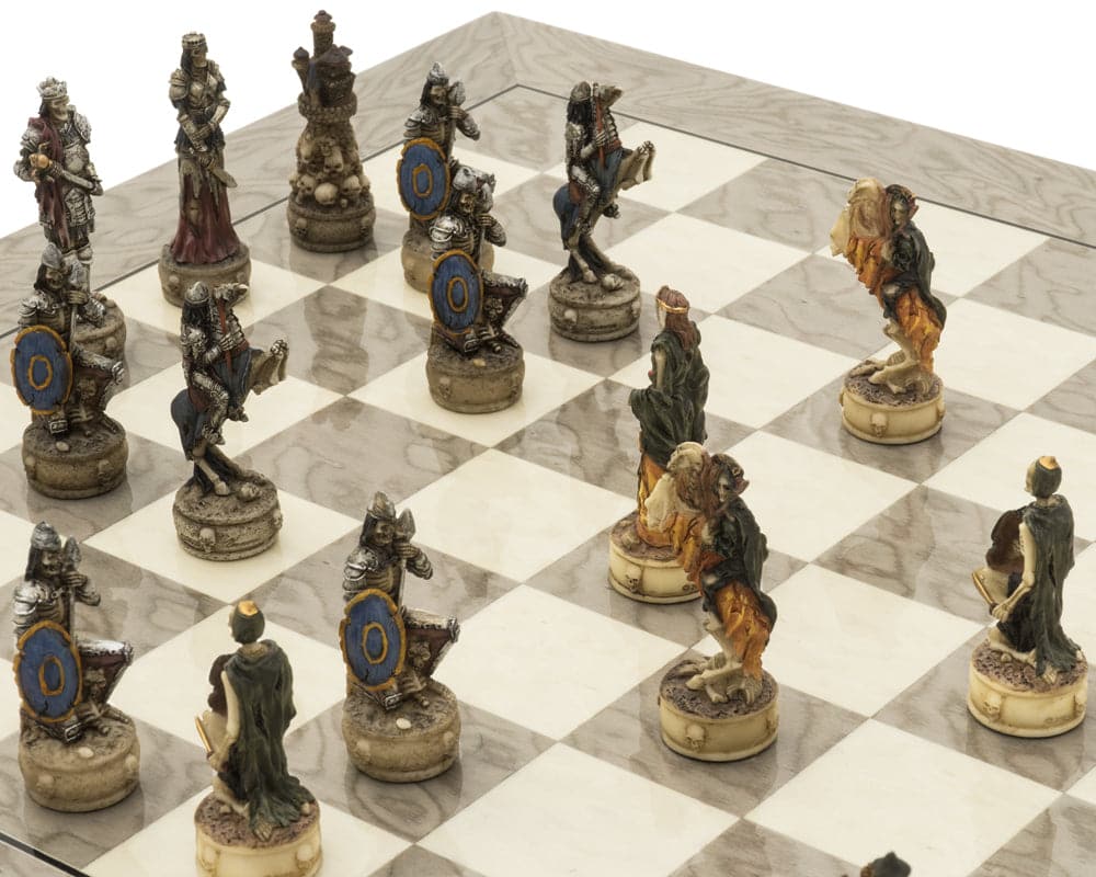 Zombie and skeletal warrior pieces on The Zombie and Grey Ash Deluxe Chess Set board.