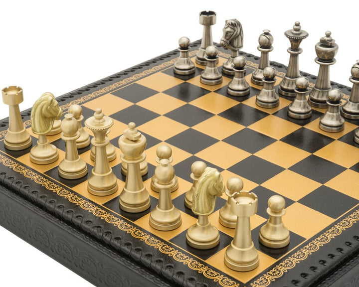 The Turin Nero Italian Chess Set on black and gold leatherette board with intricate detailing, showcasing finely crafted weighted chessmen.