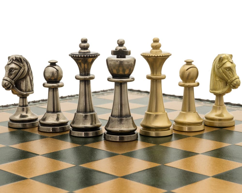 The Turin Verde Italian Chess Set with detailed metal chess pieces on a green and gold leatherette chessboard.