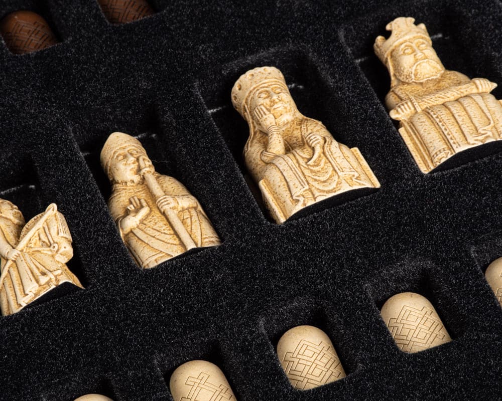 Detailed Lewis chess pieces in black foam presentation box from The Isle of Lewis and Walnut Deluxe Chess Set