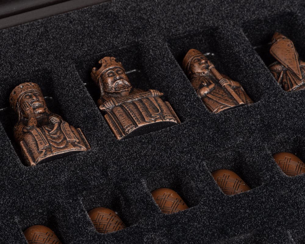 Exquisite Lewis chess pieces from The Isle of Lewis and Walnut Deluxe Chess Set in an elegant presentation case