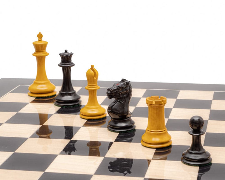 The Harrwitz Black and Anegre Staunton Chess Set with hand-carved chessmen on high gloss black and maple board with 1.9 inch squares.