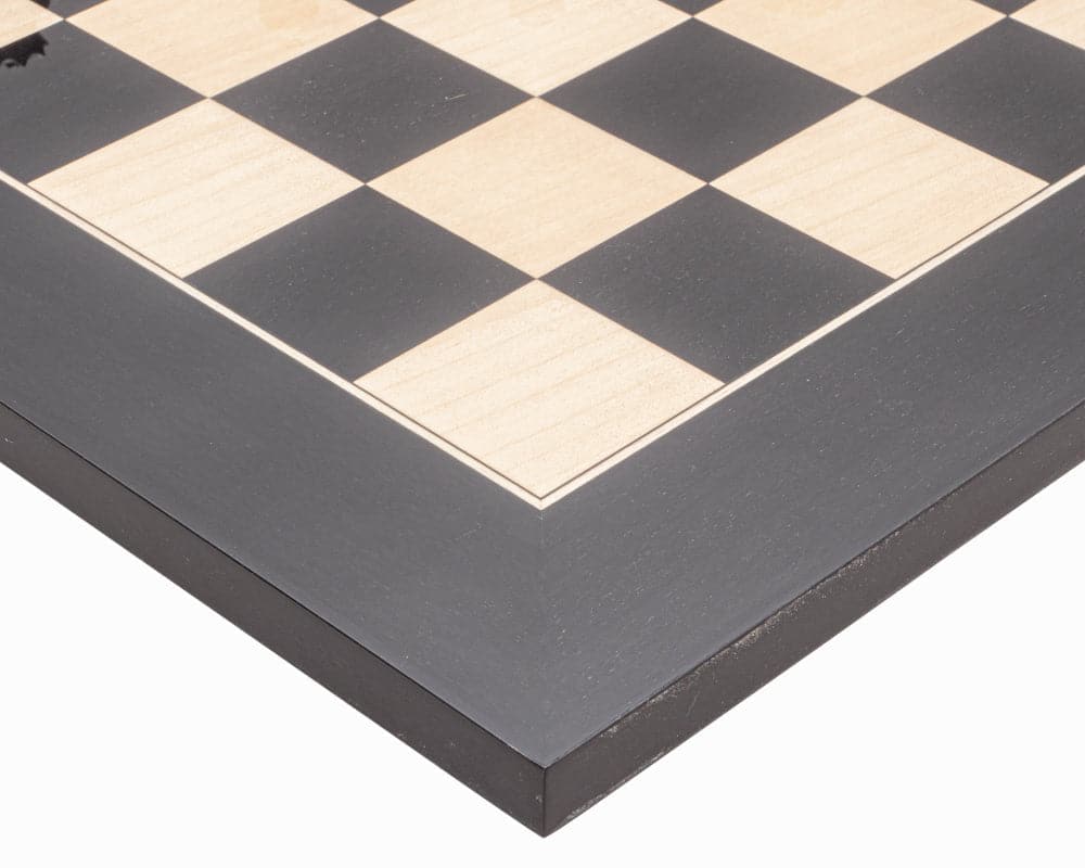 Close-up of the high gloss Black Anegre and Maple chessboard from The Harrwitz Black and Anegre Staunton Chess Set with 1.9 inch playing squares.