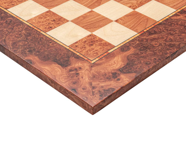 Detailed corner of luxury chess board made from high-quality Elm Burl and Maple veneers with 1.96 inch playing squares.