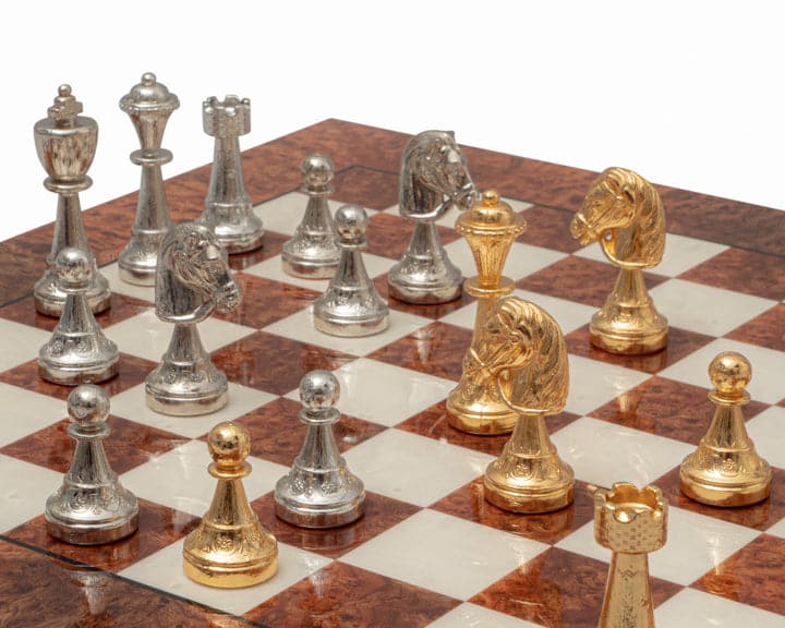 Gold and silver plated luxury Italian chess set on a briarwood and elm board with 1.55 inch squares and detailed, weighted pieces.