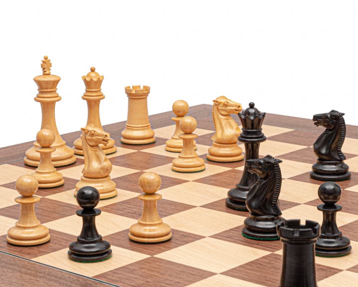 Rochester Ebony and Walnut Grand Chess Set on 23.6 inch board with detailed Staunton pieces, highlighting 4 inch king and handcrafted design.