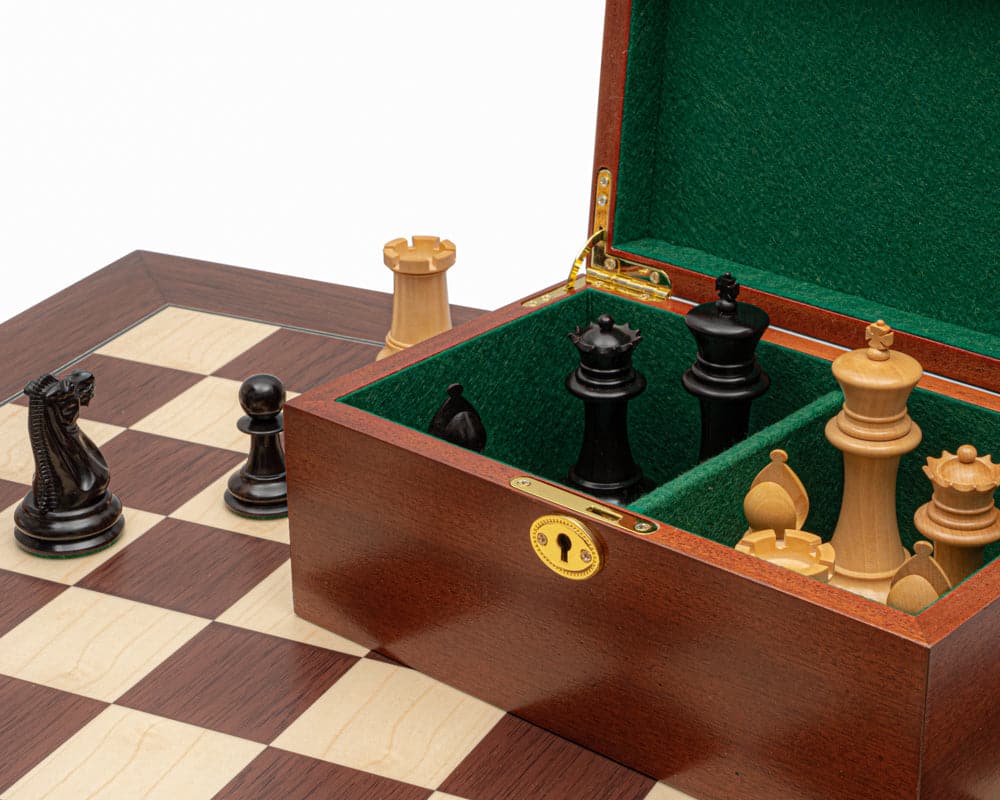 Luxury 1849 Staunton chess set with ebony and palisander pieces, mahogany cabinet with green flock lining and brass lock on 23.6 inch board.