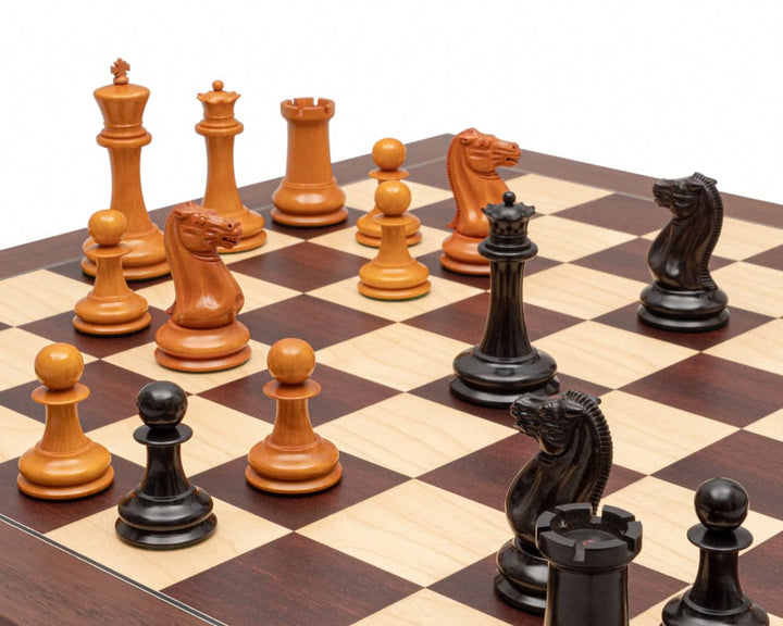 JJ Cooke Edition Ebony and Montgoy Luxury Chess Set with broad felted bases and antiqued boxwood pieces on a 23.6 inch Spanish board