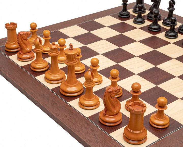 The JJ Cooke Edition Ebony and Montgoy Luxury Chess Set with antiqued boxwood pieces on a 23.6 inch Spanish board.