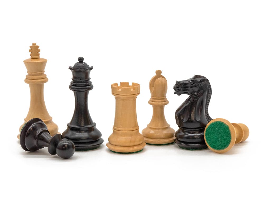 Luxury Staunton Competition Chessmen intricately crafted from wood in black and natural finish displayed upright and lying down.