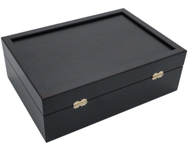 Dark wood chess piece storage case with brass hinges and clasps, crafted by Manopoulos of Greece