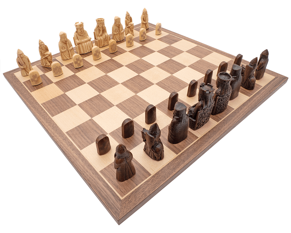 Isle of Lewis chessmen and board presentation set displaying intricately designed pieces on a beautifully crafted board